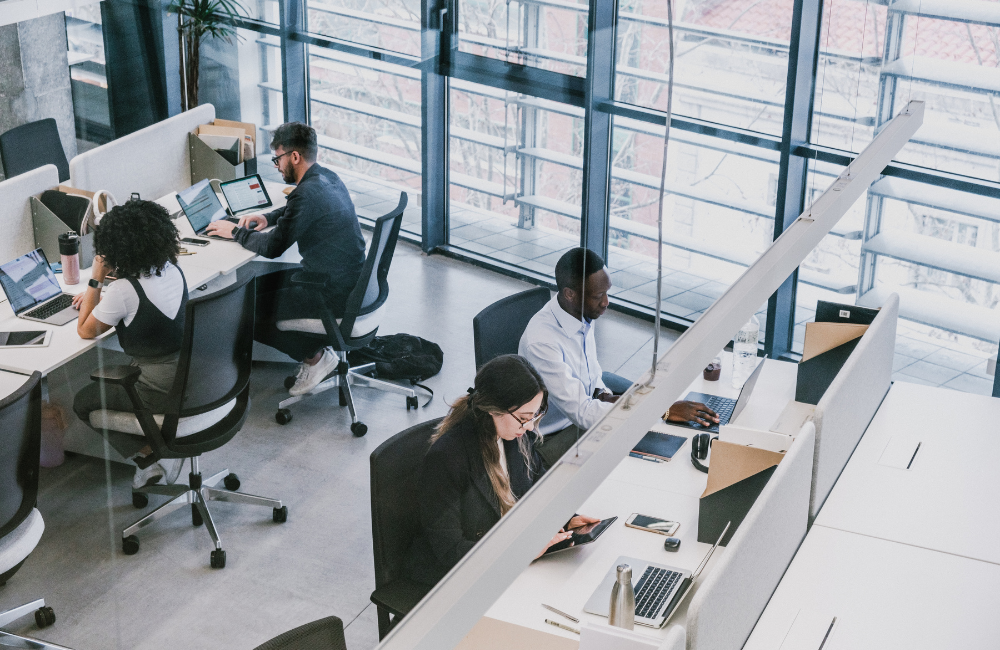 A claims team working across an open office