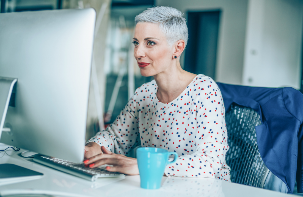 A claims professional submitting a records request at a laptop